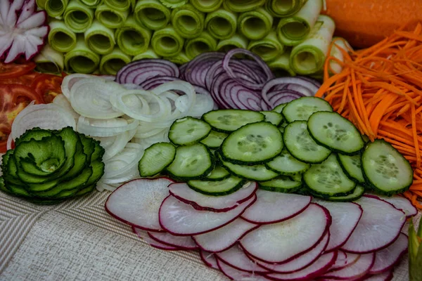 Variety of carving vegetables .Fruit and vegetable carving . Food decoration. Vegetable flowers