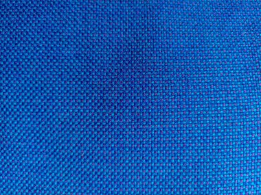 Mavi kumaştan katlanmış arka plan. Kumaşın dokusu. mavi kumaş kumaş arkaplan dokusu .