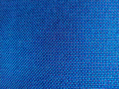 Mavi kumaştan katlanmış arka plan. Kumaşın dokusu. mavi kumaş kumaş arkaplan dokusu .