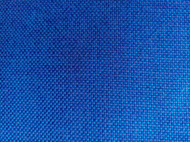 Mavi kumaştan katlanmış arka plan. Kumaşın dokusu. mavi kumaş kumaş arkaplan dokusu .