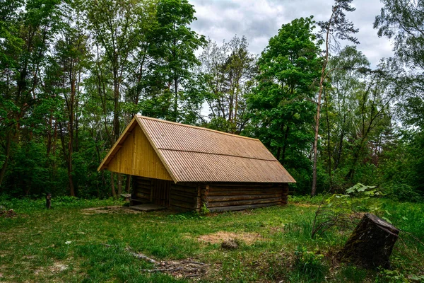 Wood house in the forest .Old wooden house middle of forest.old wooden house in the forest, digital photo picture as a background .