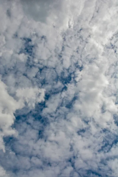 Clouds with blue sky .Cloud sky beautiful with blue and white clouds background on daylight .Natural daylight and white clouds floating on blue sky