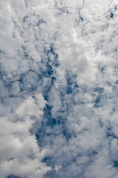 Clouds with blue sky .Cloud sky beautiful with blue and white clouds background on daylight .Natural daylight and white clouds floating on blue sky