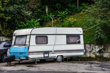 Family traveling in camper,house on wheels,trailer,motor home. Romantic road travel,freedom life.