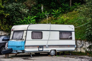 Family traveling in camper,house on wheels,trailer,motor home. Romantic road travel,freedom life.