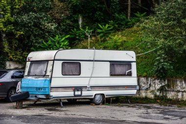 Family traveling in camper,house on wheels,trailer,motor home. Romantic road travel,freedom life.