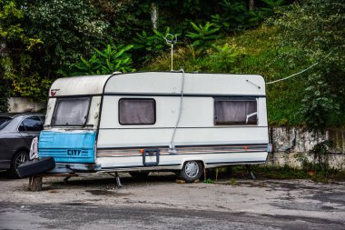 Family traveling in camper,house on wheels,trailer,motor home. Romantic road travel,freedom life.