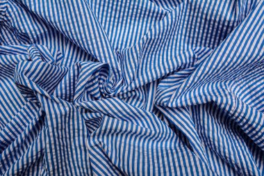 blue stripe pattern on linen fabric, tablecloth pattern background .Print and design consisting of stripes.
