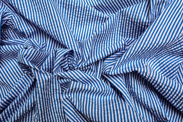 blue stripe pattern on linen fabric, tablecloth pattern background .Print and design consisting of stripes.