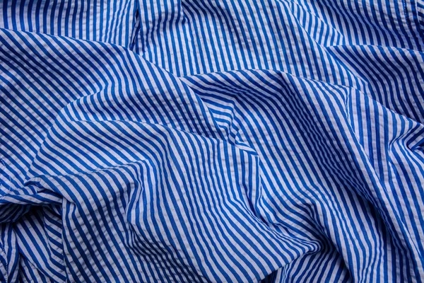 blue stripe pattern on linen fabric, tablecloth pattern background .Print and design consisting of stripes.