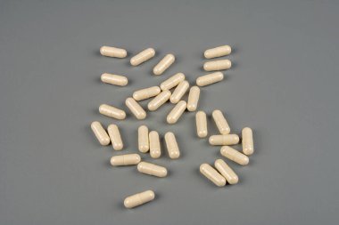 Pile of pills, copy space top .Medical and Healthcare Concept.herb turmeric capsules.