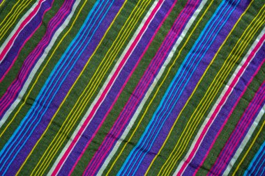 typical central asian striped decor of fabric .National Uzbek men's striped clothing.