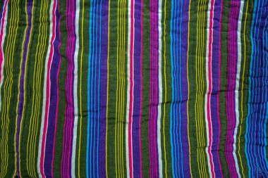 typical central asian striped decor of fabric .National Uzbek men's striped clothing.