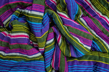 typical central asian striped decor of fabric .National Uzbek men's striped clothing.