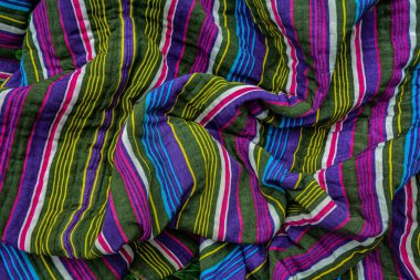 typical central asian striped decor of fabric .National Uzbek men's striped clothing.