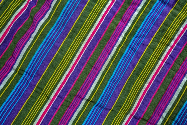 typical central asian striped decor of fabric .National Uzbek men's striped clothing.