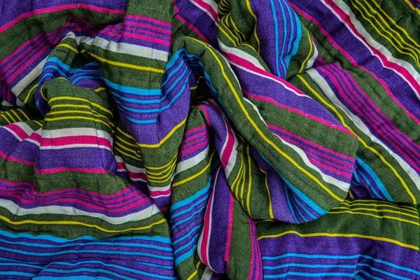 typical central asian striped decor of fabric .National Uzbek men's striped clothing.