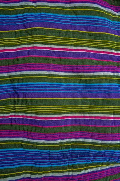 typical central asian striped decor of fabric .National Uzbek men's striped clothing.