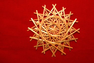 Very beautiful snowflakes woven from rye straw. Folk craft traditions.