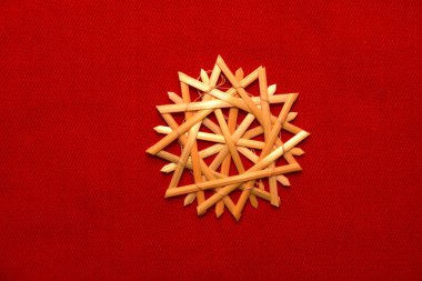 Very beautiful snowflakes woven from rye straw. Folk craft traditions.