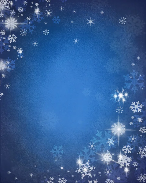 Снежинки на синем фоне — стоковое фото