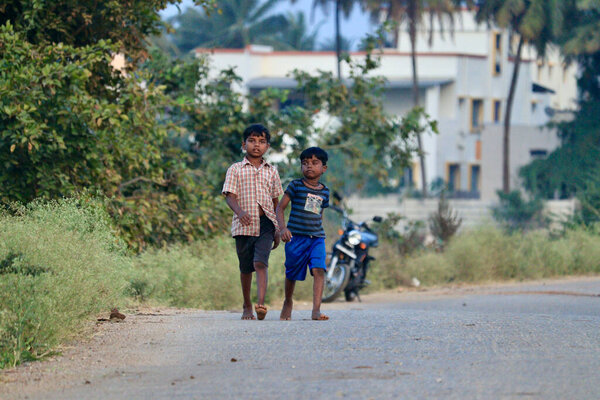 Davangere, Karnataka, India - January 7, 2022: A portrait of two young Indian Village boys(friends).