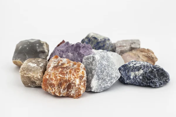 Composition of various crystals on white background. — Stock Photo, Image