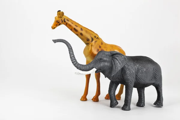 Brinquedo plástico animais girafa e elefante Fotografia De Stock