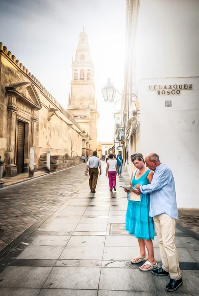 Turistas procurando mapa na rua de Córdoba, Espanha . Imagem De Stock