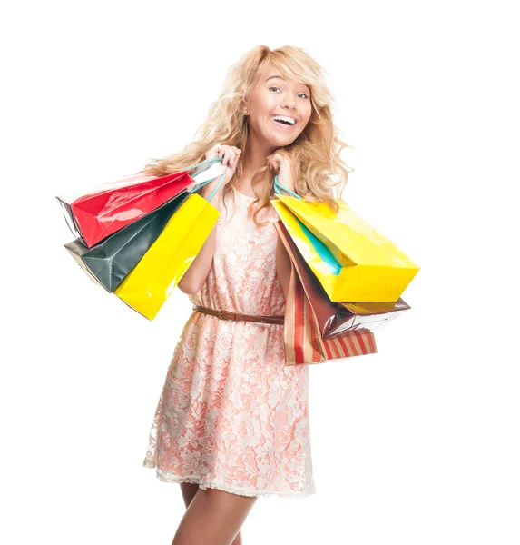 Beautiful en happy jonge vrouw met shopping tassen. — Stockfoto