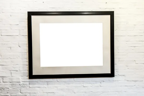 Black frame with blank space on brick wall. — Stock Photo, Image