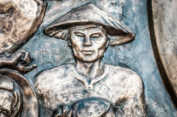 Parte del monumento con el hombre de sombrero en Vietnam, Asia . — Foto de Stock