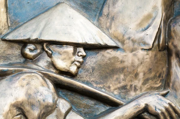 Památník s mužem v klobouku — Stock fotografie
