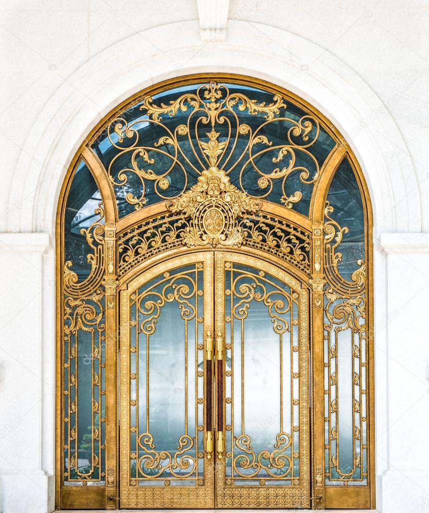 Door with gold ornate pattern