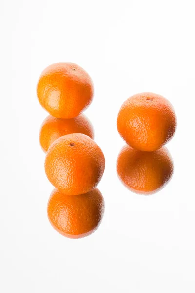 Closeup of three fresh mandarins — Stock Photo, Image