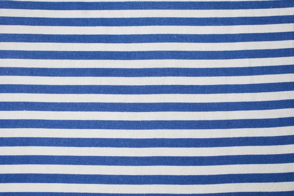Текстильный фон с красочными голубыми и белыми полосами — стоковое фото