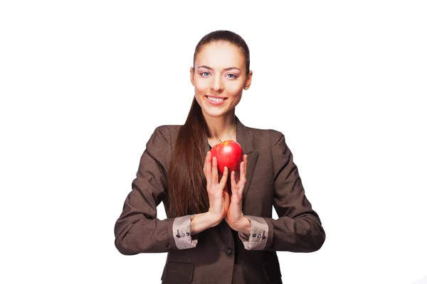 Schöne junge Geschäftsfrau ruht sich mit einem Apfel aus — Stockfoto