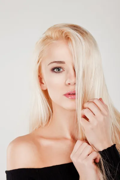 Young beautiful sexy blond girl on white background — Stock Photo, Image