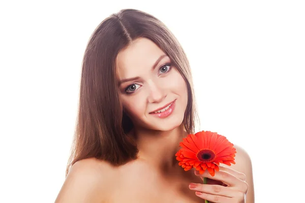 Retrato de una joven hermosa mujer con gerberas rojas —  Fotos de Stock