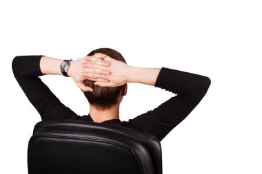 Rear view businessman with hands behind his head