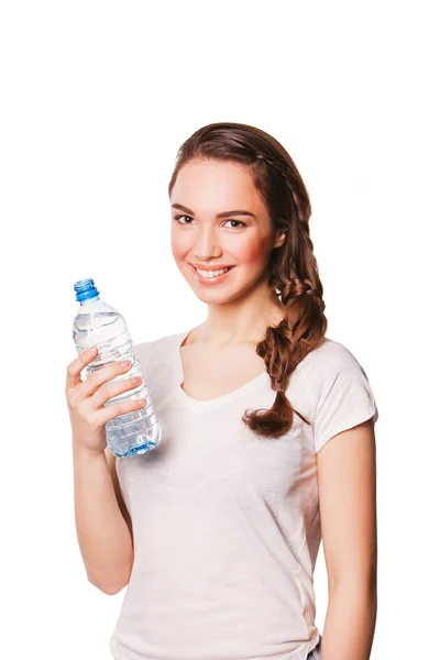 Attractive smiling woman drinking water. — Stock Photo, Image