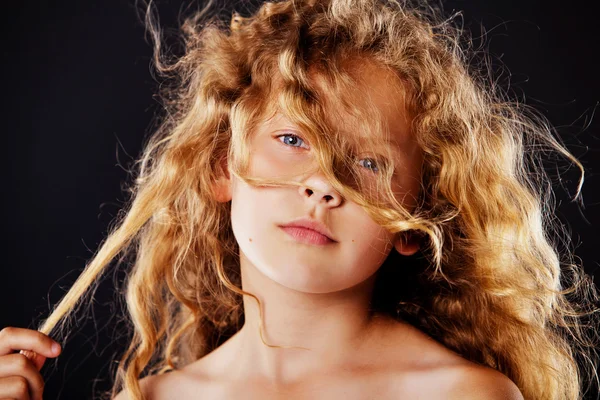 Portrait of little girl with windy hair. Fashion photo — Stock Photo, Image