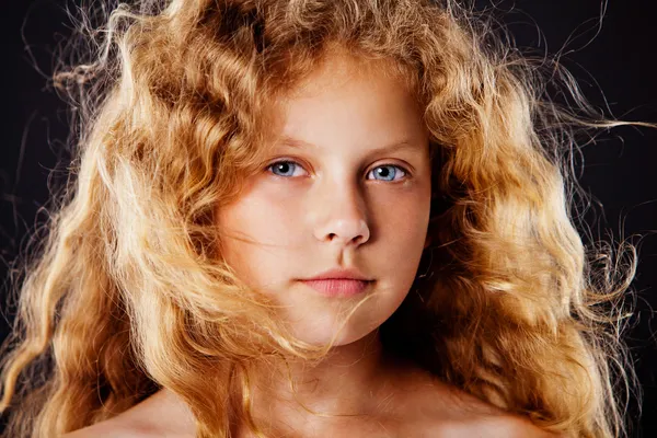 Portrait of pretty little girl with windy hair. Fashion photo — Stock Photo, Image