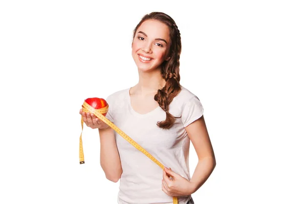 Femme heureuse en bonne santé avec pomme rouge et ruban à mesurer — Photo