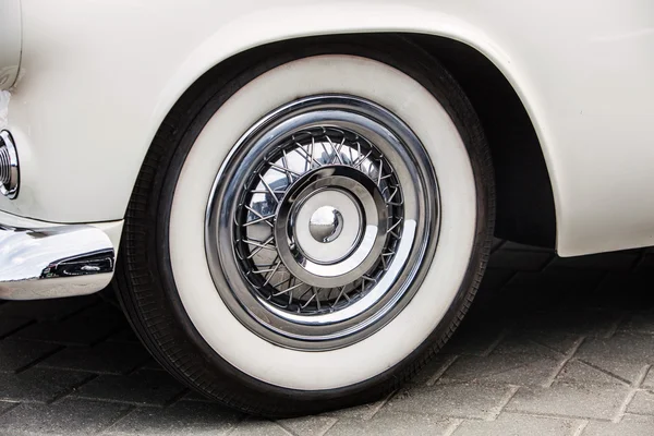 Detail of the back wheel a vintage car Royalty Free Stock Images