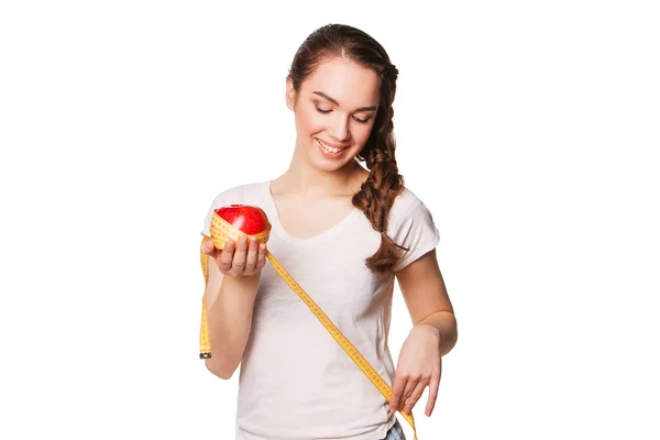 Healthy happy woman with apple and tape measure — Stock Photo, Image