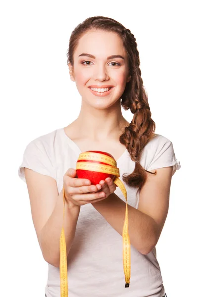Mulher feliz atraente com medida de maçã e fita — Fotografia de Stock