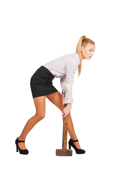 Young attractive businesswoman with hammer — Stock Photo, Image