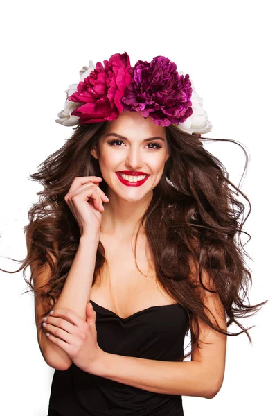 Woman with peonies on head — Stock Photo, Image