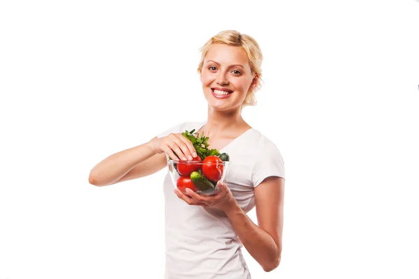 Mulher sorridente feliz com legumes isolados em branco — Fotografia de Stock